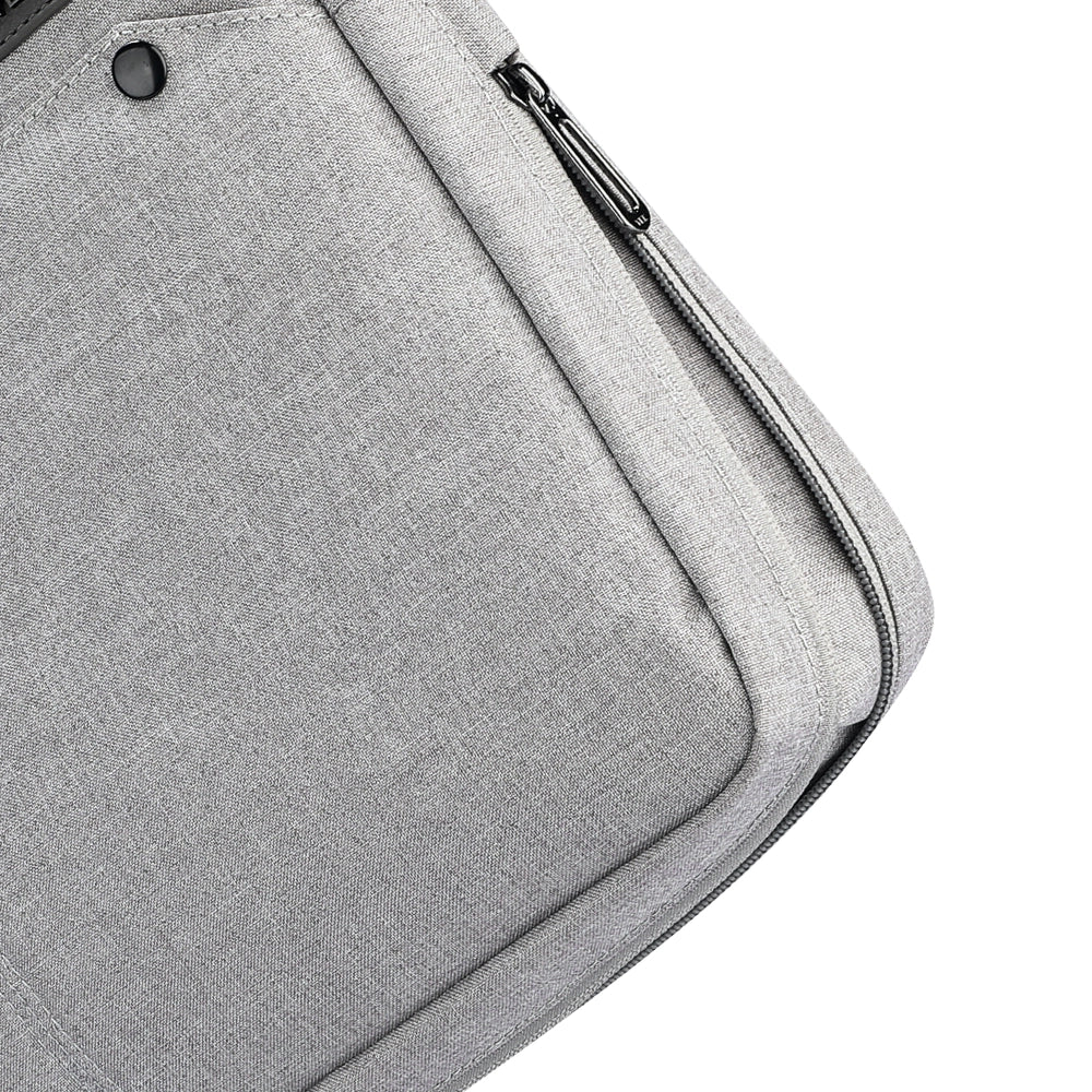 MarkRyden Classic I Tech Commuter Briefcase in gray fabric, featuring a zipper pocket and button detail, designed for 14/15.6 inch laptops.
