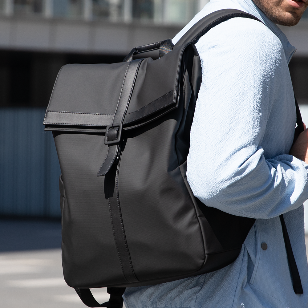 Professional black commuter backpack with buckle detail by MarkRyden - lightweight style