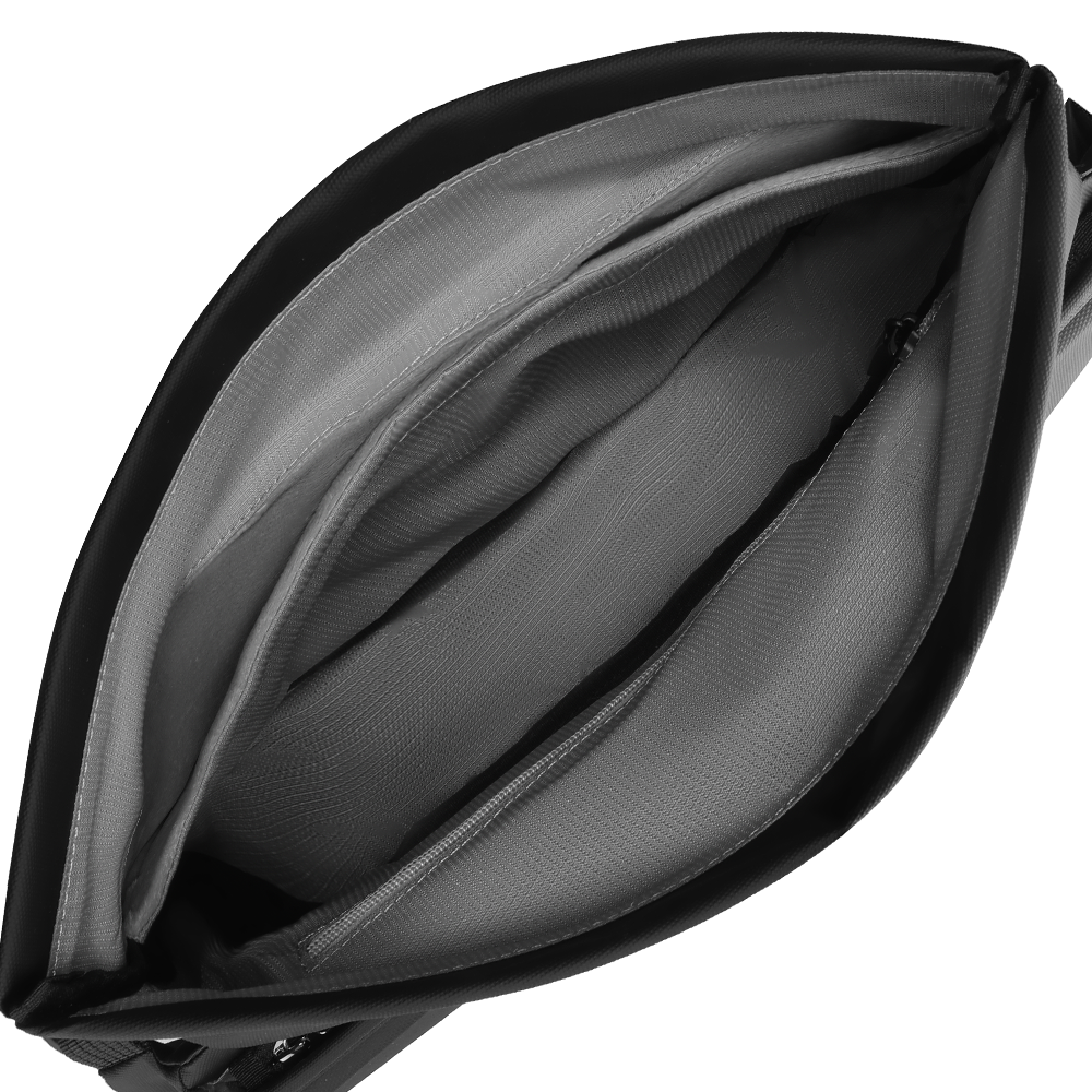 Interior of Diamond Facets large capacity waterproof scratch-resistant hard case crossbody bag with gray lining, multiple compartments, and zippered pocket.