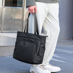 MetroCourier: Tech-Integrated Messenger Bag with Dedicated Charger Compartment
