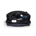Black Switchstorage IV Convertible Toiletry Crossbody Bag with multiple compartments holding phone, charger, cables, and small bottles for organized travel.