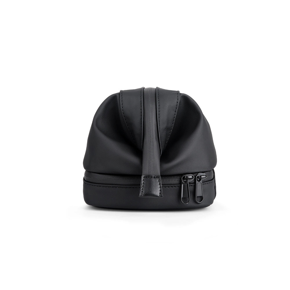 Black Switchstorage V toiletry bag with wet/dry sections for modern travelers by MARKRYDEN