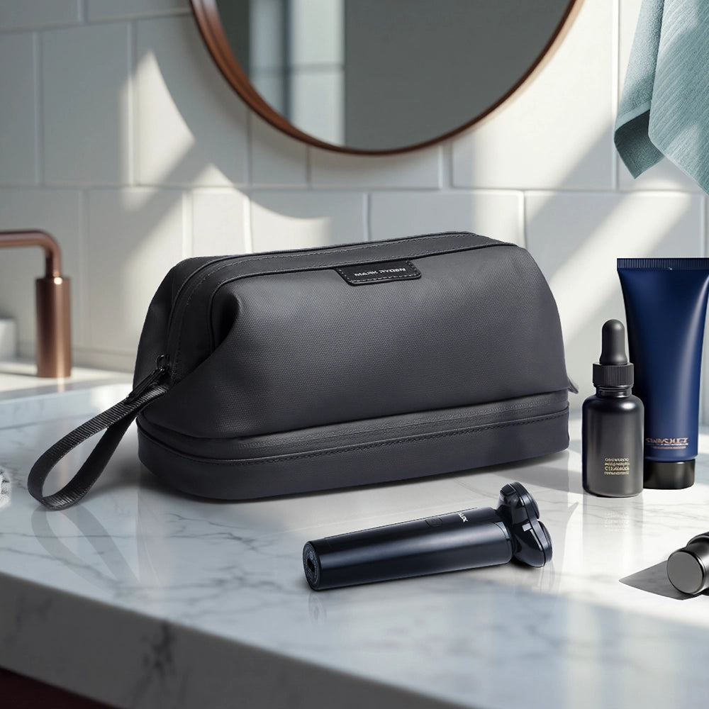 Mark Ryden black toiletry bag with wet/dry areas for modern travelers