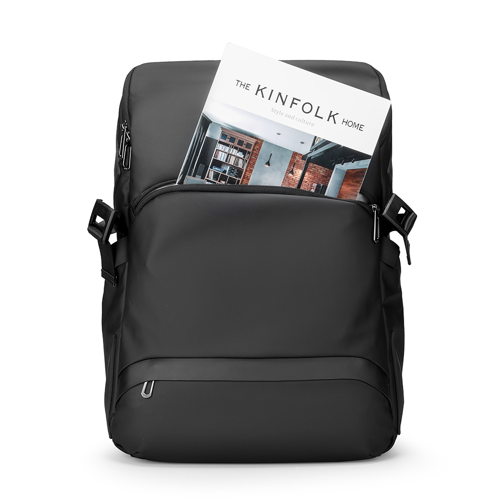MarkRyden Almighty black combination backpack with The Kinfolk Home magazine