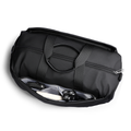 Black leather multifunctional fitness sports handheld crossbody bag with open compartment revealing gray lining and items like a razor.