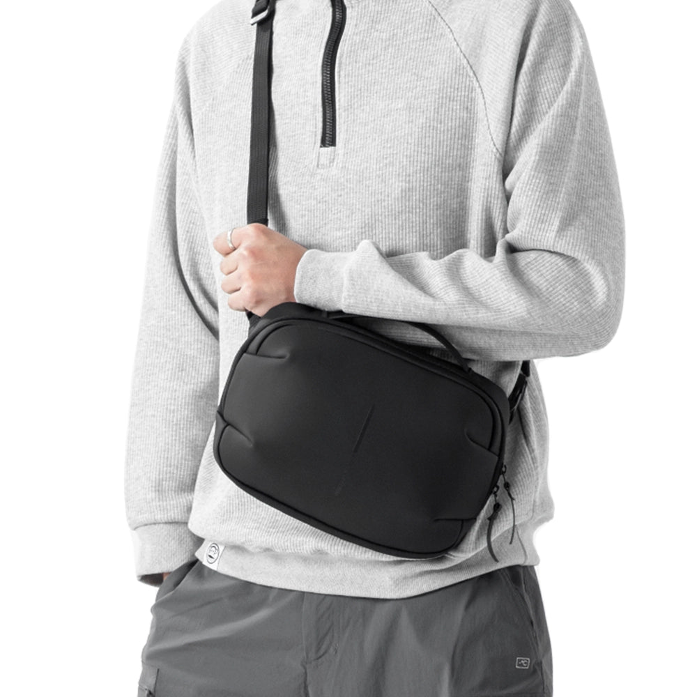 MarkRyden AquaLite waterproof PU leather sling bag - modern daily