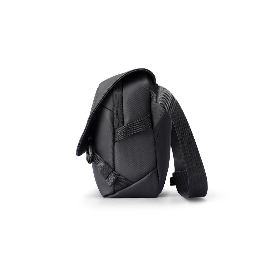 Black waterproof switch sling bag for urban gamers - MarkRyden travel essential