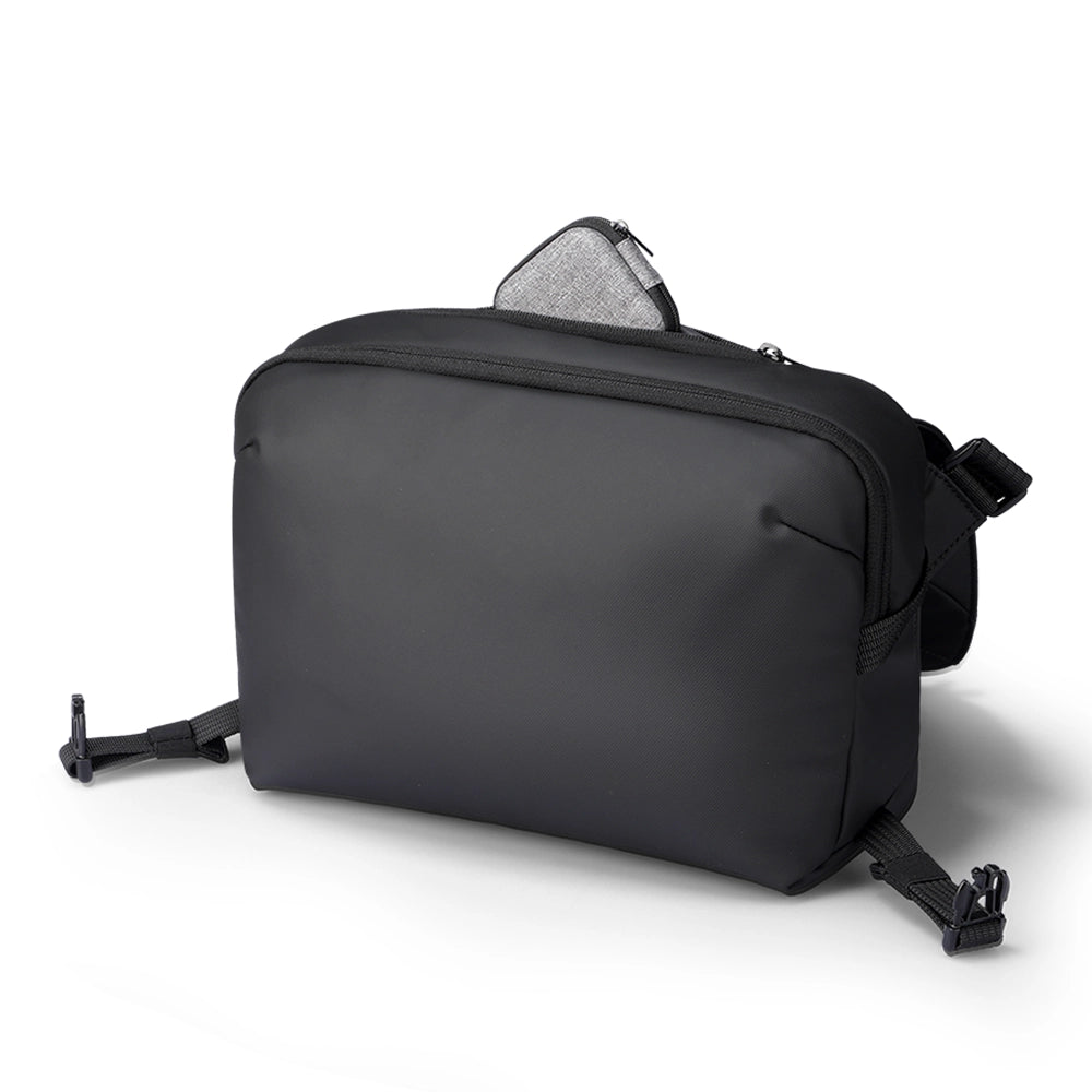 Black waterproof Switch sling bag for urban gamers with gray accents