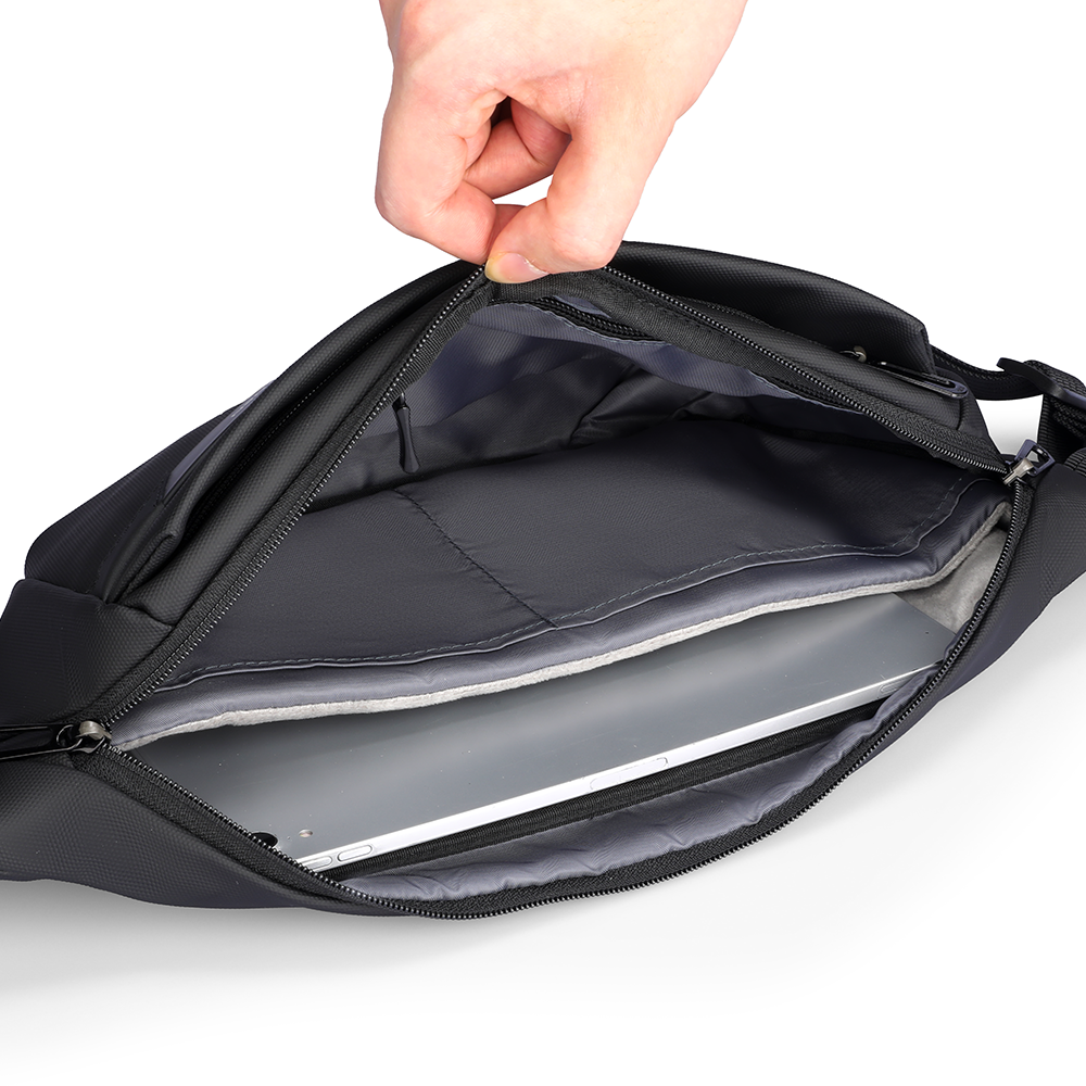 MarkRyden waterproof crossbody bag opening to show laptop storage interior