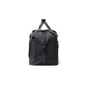 Black NomadFlex 3-in-1 waterproof gym bag with gray straps, front zipper, and buckle, designed for fitness enthusiasts.