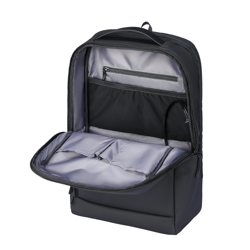 Black UrbanFlex Lite lightweight backpack with open gray interior showing padded computer compartment, zippered pocket, and mesh sections for business use.