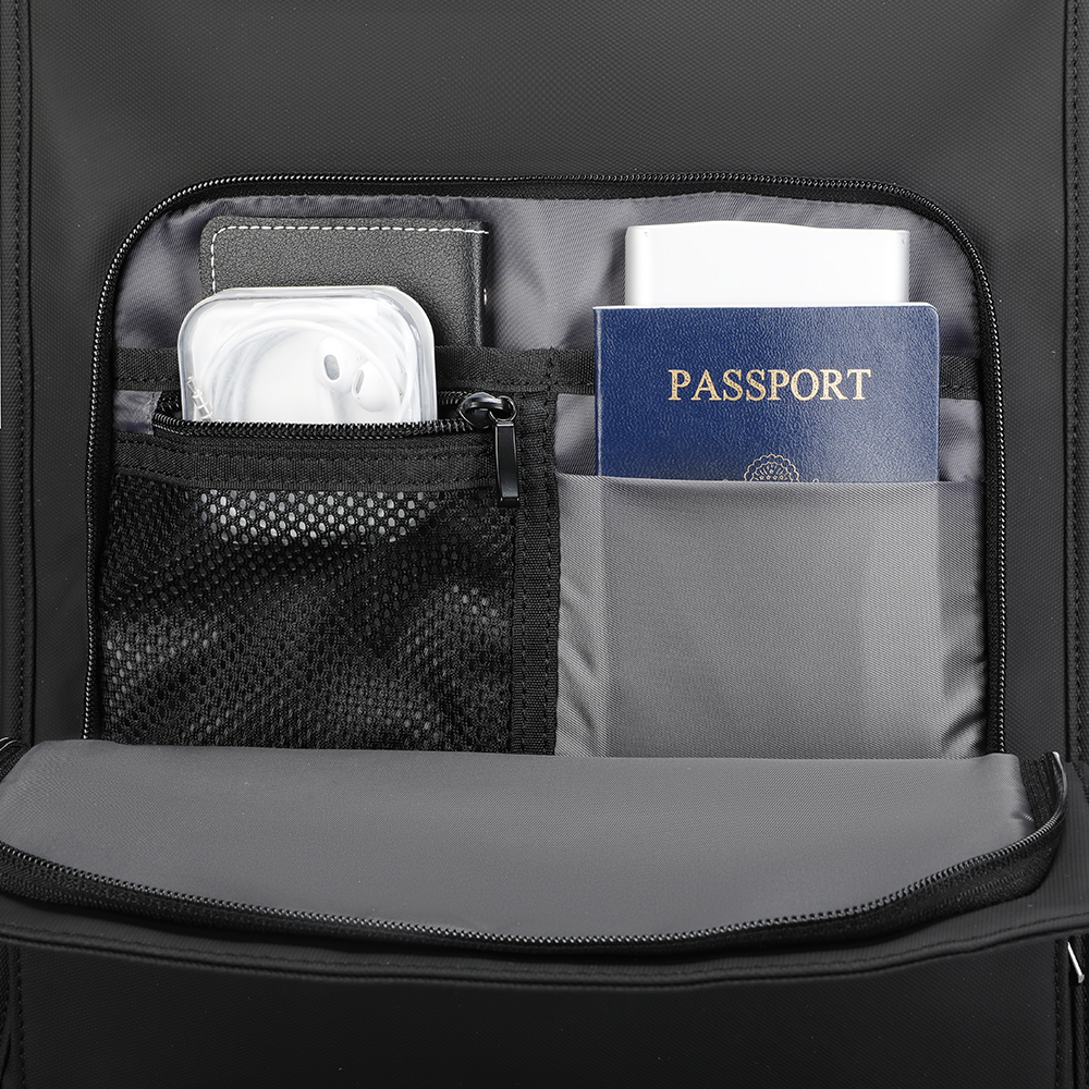 MUKE III Black Oxford Backpack interior with mesh pocket holding earbuds, passport in gray compartment, wallet, and power bank