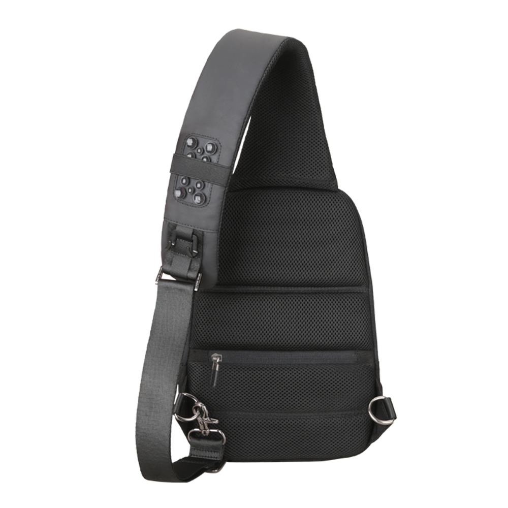 Black Mini Julius lightweight crossbody bag featuring mesh panels, padded shoulder strap with buttons, front zip pocket, and metal hardware for USB charging.