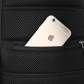 Mini Julius lightweight crossbody bag with USB charging - black mesh pocket holding gold iPhone