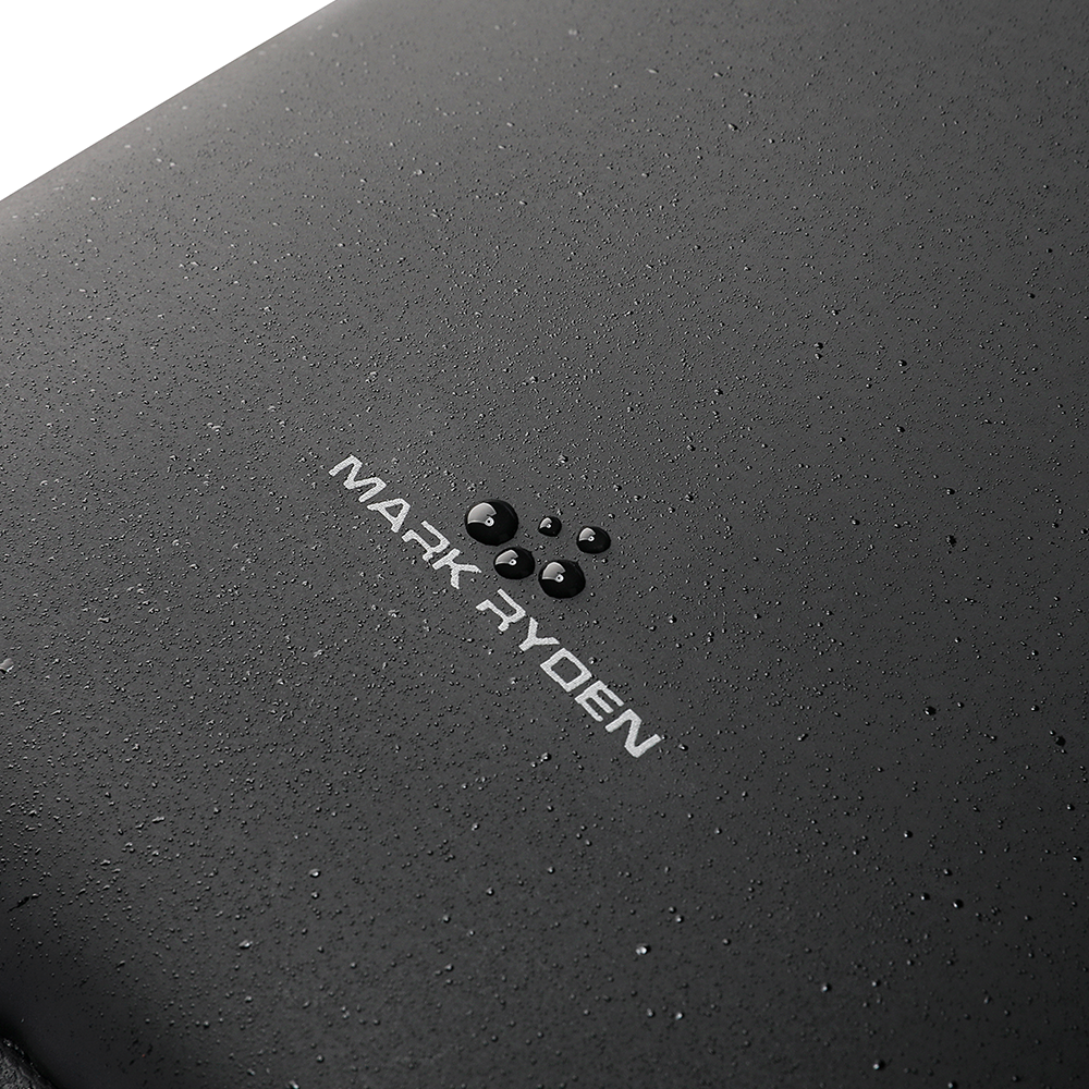 Mark Ryden ProCarry black water-resistant anti-theft bag with water droplets