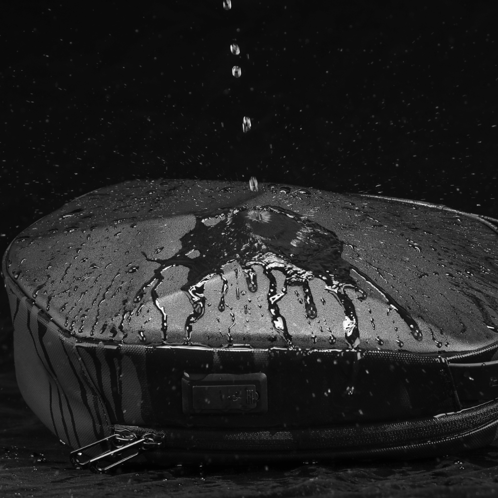 MarkRyden rhombus masonry-inspired water-repellent crossbody bag waterproof test