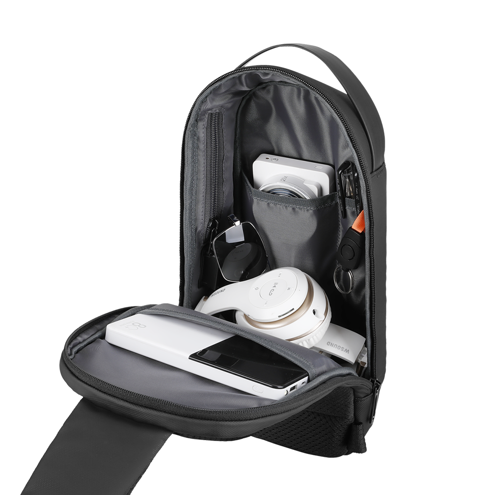 MARKRYDEN Torino sling bag with hidden pockets, USB port, adjustable strap - holds camera, headphones, phone (black)