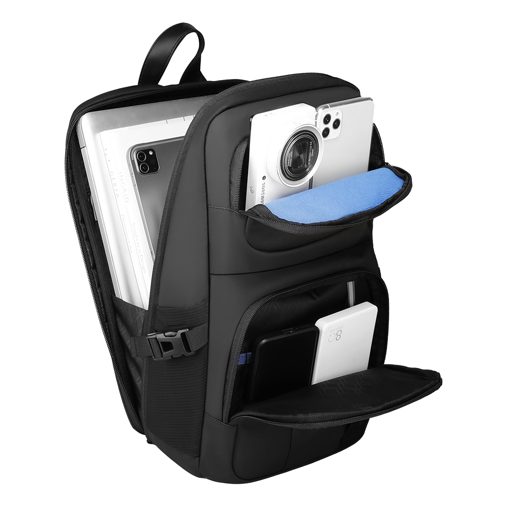 MarkRyden black waterproof crossbody bag with spacious compartments holding laptop, camera, phone