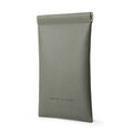 Gray faux leather sunglasses pouch with zip closure by MARK RYDEN, ideal for carrying eyeglasses or data cables.