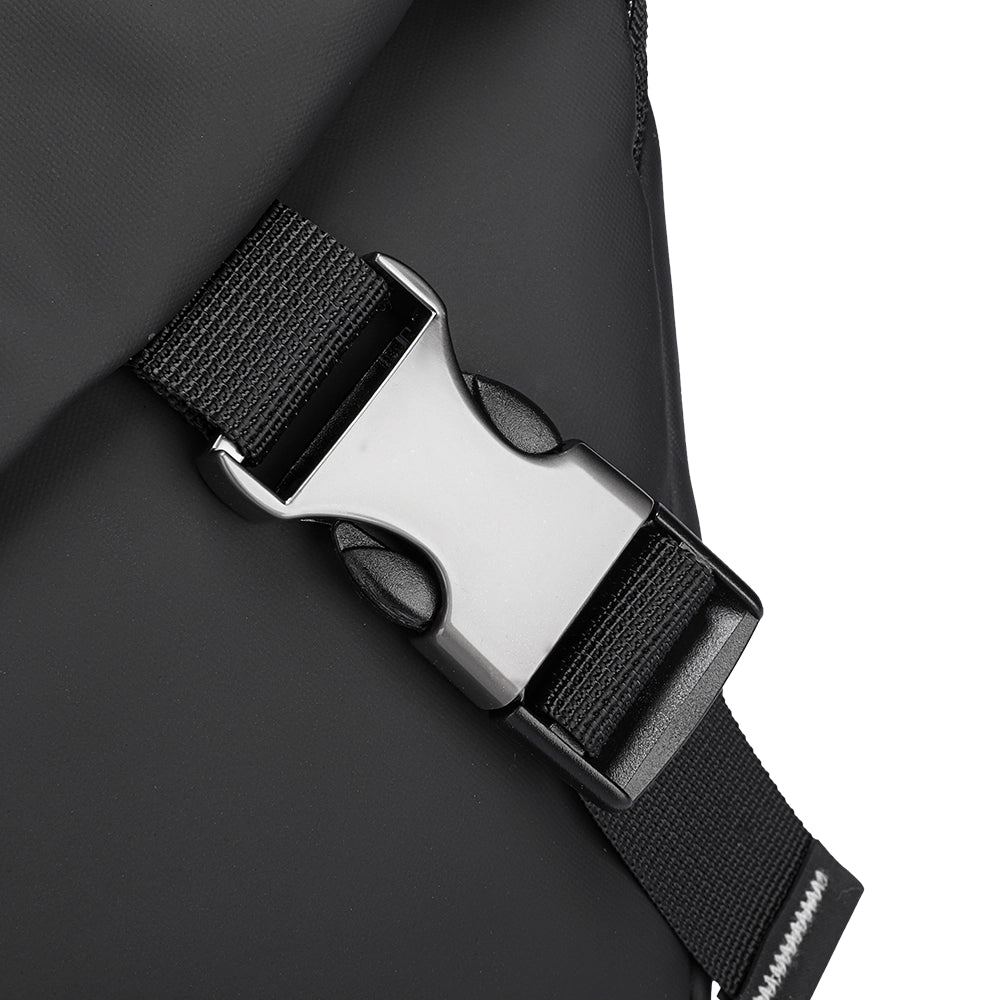 Close-up of the metallic silver buckle on the black strap of the Harvey leather waterproof multifunction messenger bag.