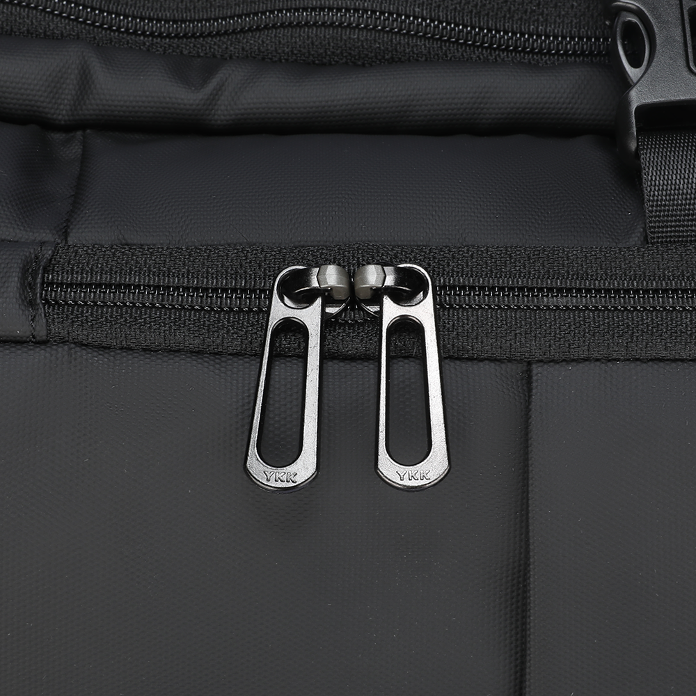 MarkRyden black backpack with silver YKK zipper pulls, minimalistic design detail