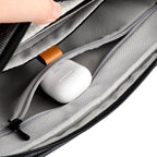 Fingon Ⅰ leather large capacity commuter bag interior with zip pocket holding white AirPods case