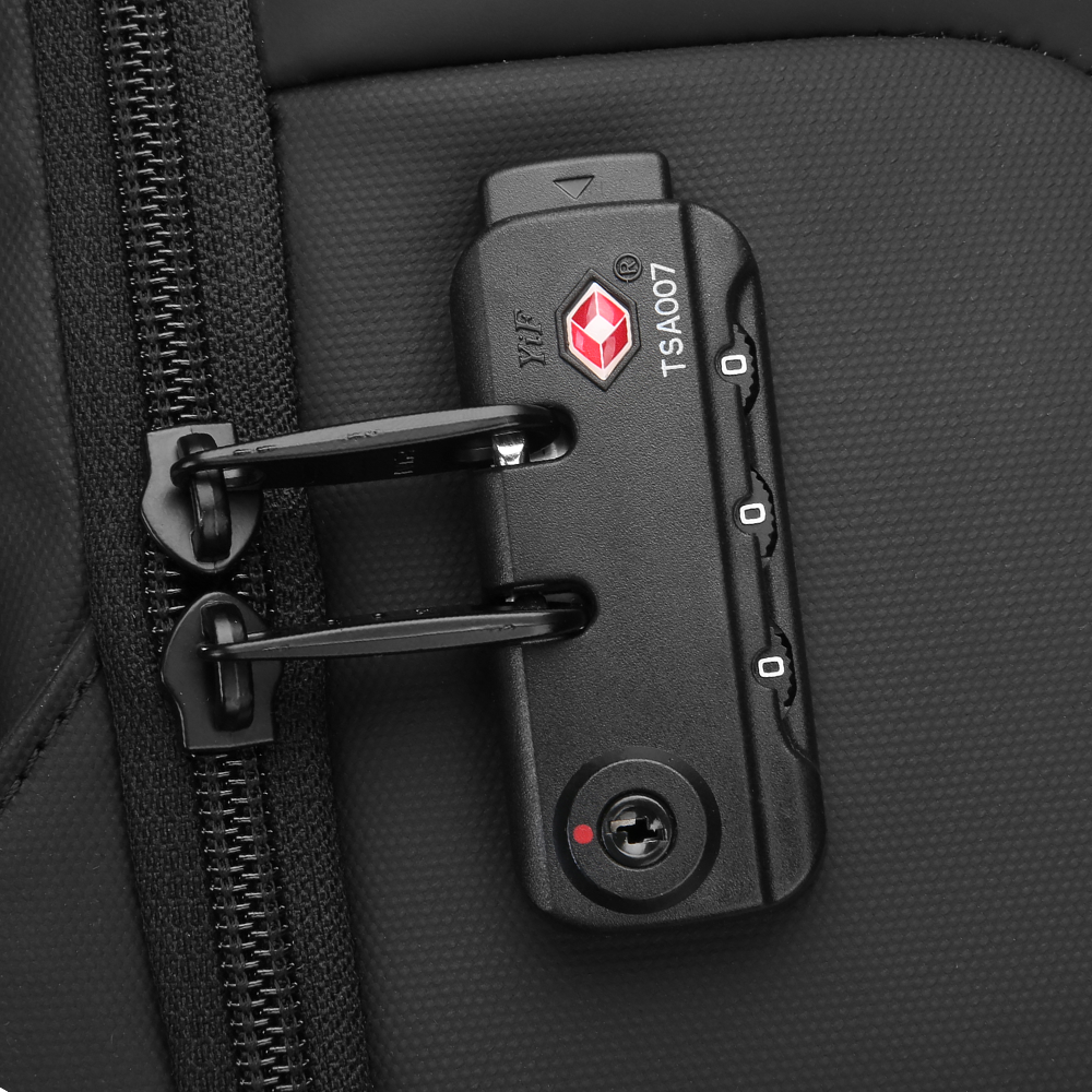 Black TSA007 combination lock with red diamond logo attached to backpack zipper, showcasing anti-theft security feature.