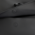 MarkRyden black minimalist backpack with buckle and stitching detail for daily commute