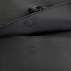 MarkRyden black minimalist backpack with buckle and stitching detail for daily commute