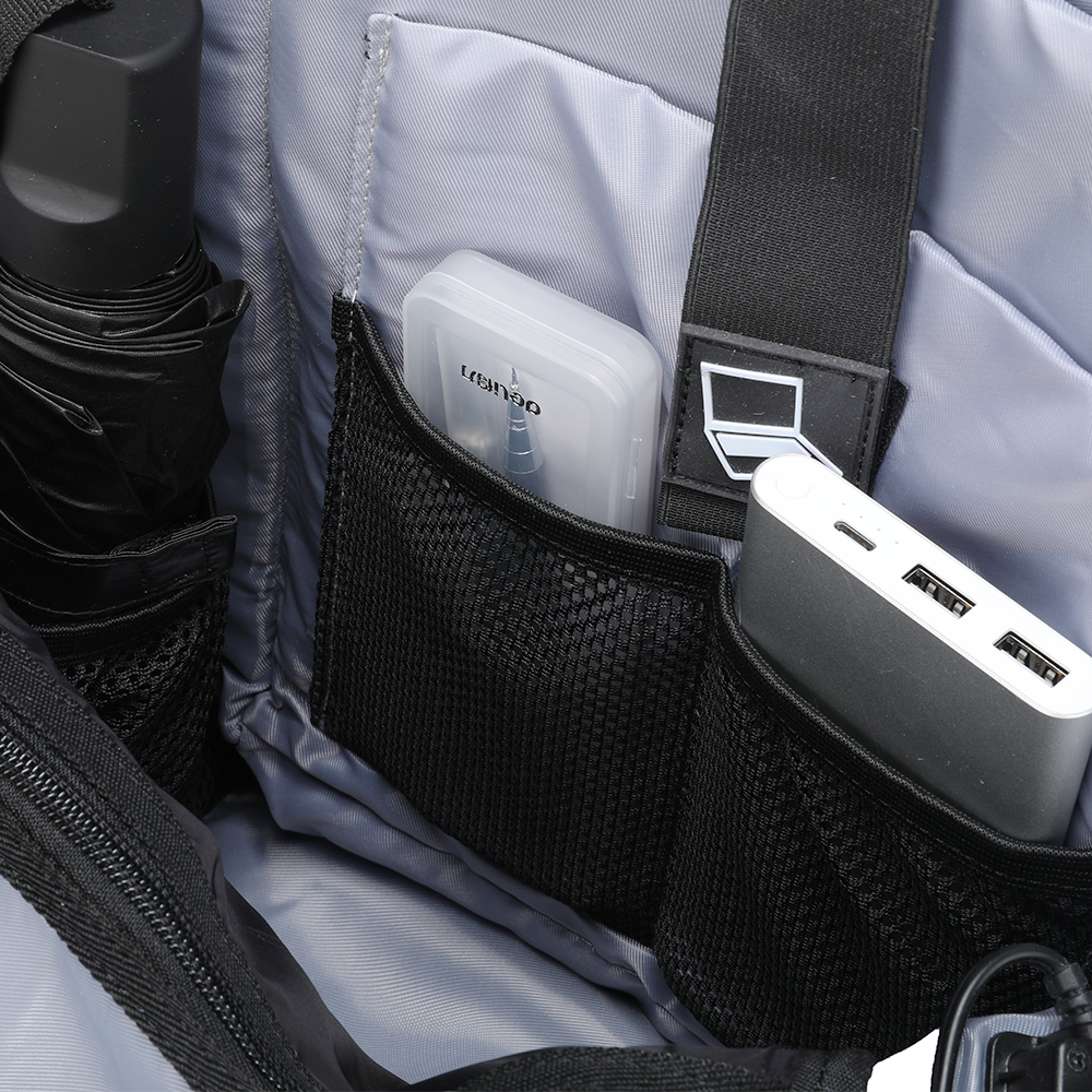 Softologic backpack interior with organized compartments holding power bank and accessories