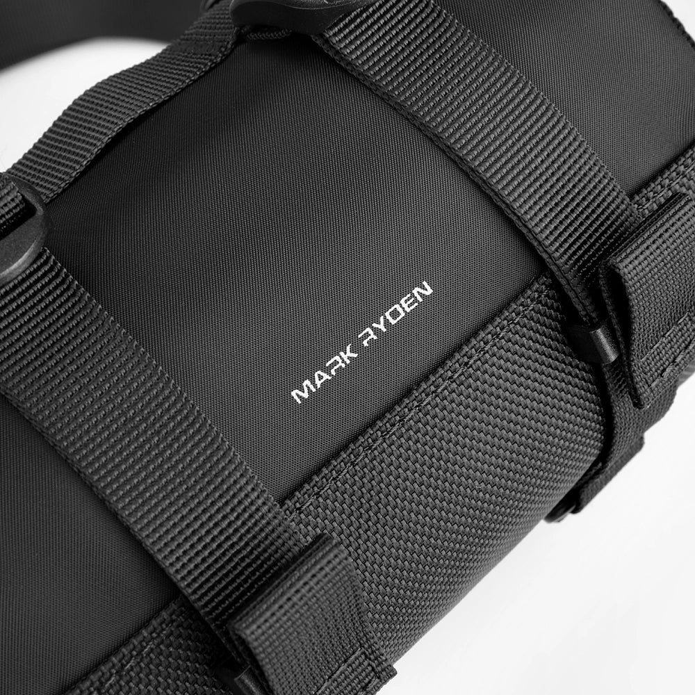 Mark Ryden black cylinder crossbody bag with straps
